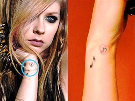 avril lavigne piercings|avril lavigne wrist tattoo.